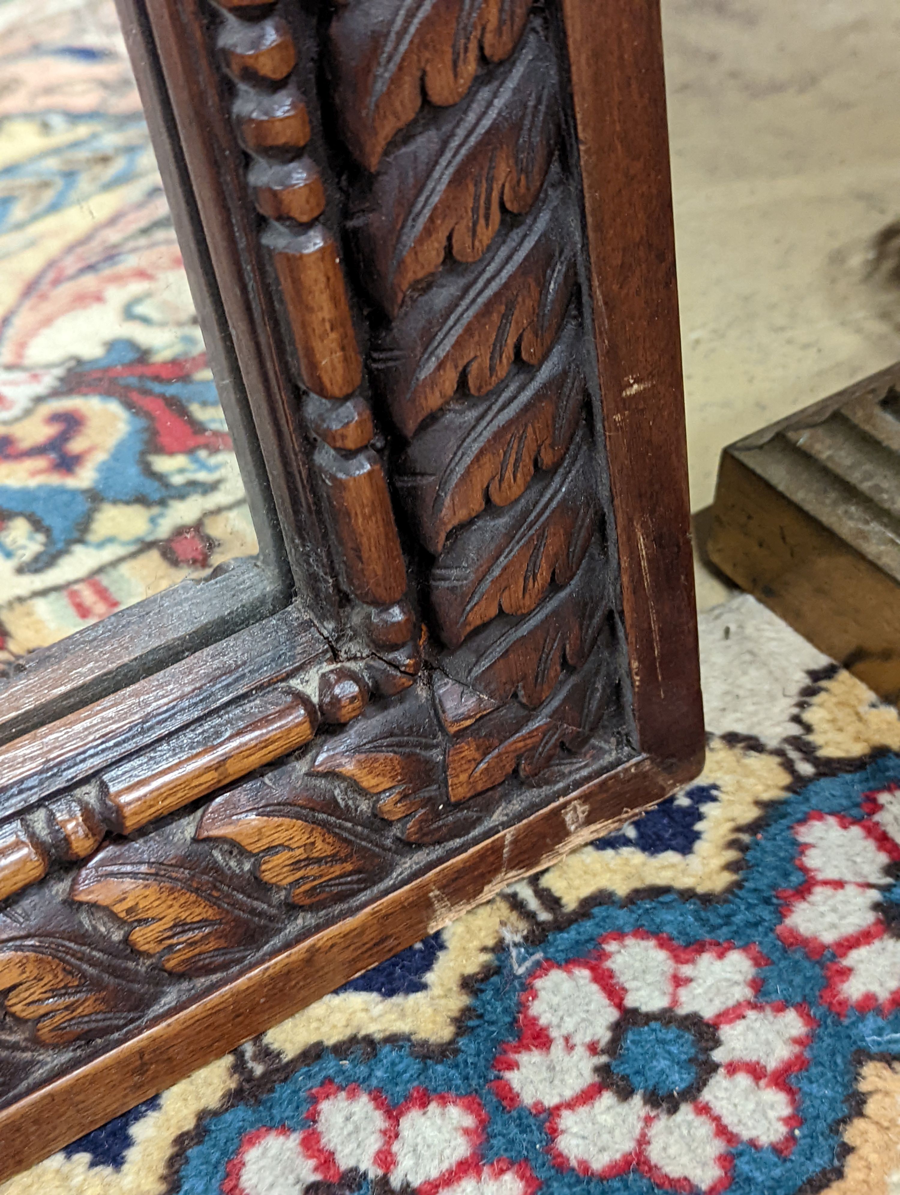 A carved mahogany rectangular wall mirror, width 82cm, height 110cm